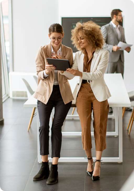 two girls using tablet